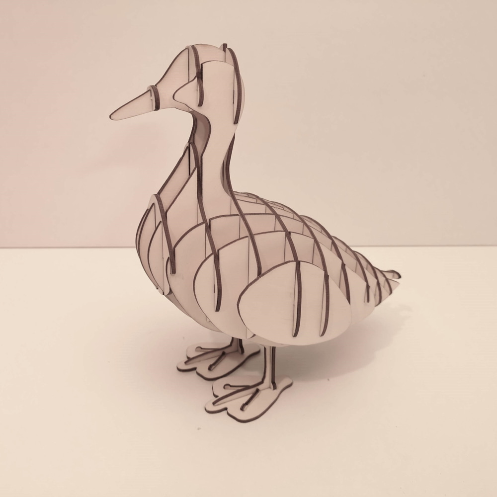 imagem do arquivo vetor para download Quebra Cabeça de Pato em Madeira em 3D