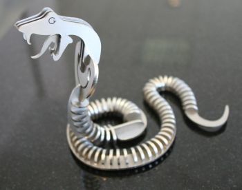 imagem do arquivo vetor para download Quebra cabeça de Cobra 3mm 